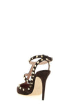 the valentino garavani rockstud pumps define the silhouette through a t-struct