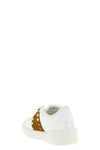 the valentino garavani rockstud untitled sneakers redefine everyday luxury thr