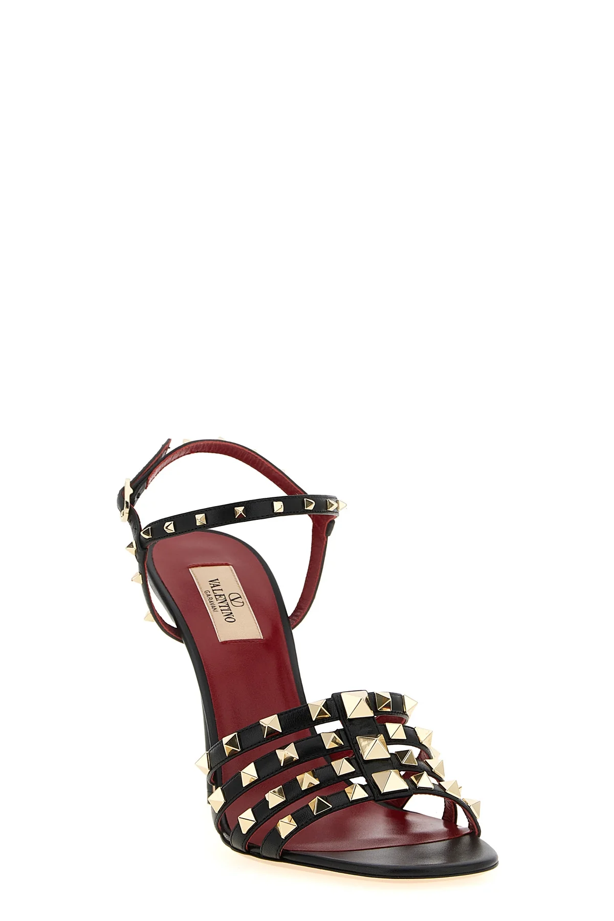 valentino garavani sandals define a bold silhouette through a construction in fi