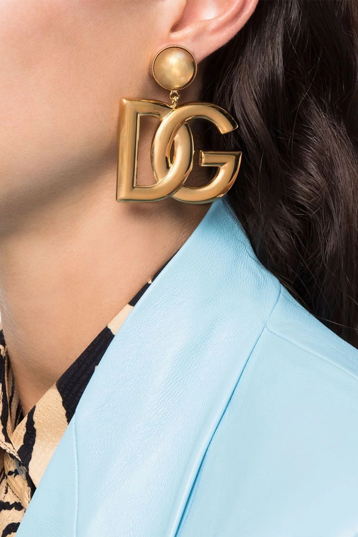 gold metal earrings