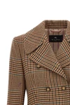 the double-breasted coat etro redefines the codes of tailoring through a rigorou