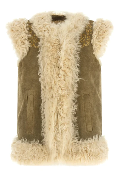the etro vest in fine shearling stands out for its sartorial construction that e