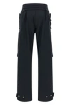 adrianadarkpark cargo pants redefine utilitarian volumes through rigorous sarto