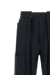 adrianadarkpark cargo pants redefine utilitarian volumes through rigorous sarto