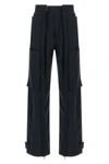 adrianadarkpark cargo pants redefine utilitarian volumes through rigorous sarto