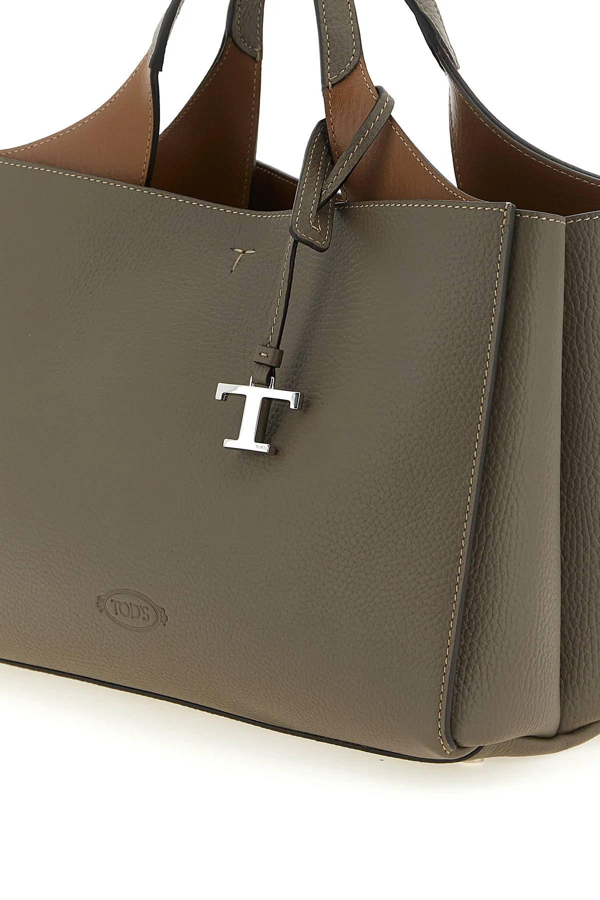 the tods small handbag is made of fine hammered taupe calf leather