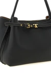 the tods tim handbag embodies craftsmanship excellence through a structured sil