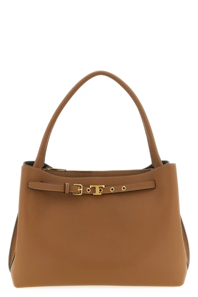 the handbag tods tim top handle piccola stands out for a structured silhouette