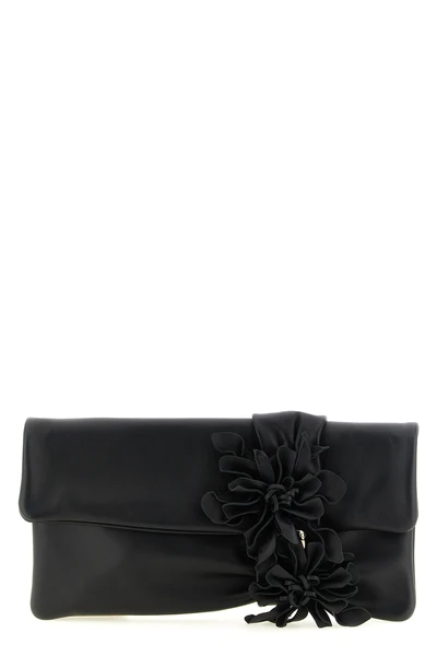 the jimmy choo zandra clutch defines a new concept of evening elegance through