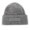 knitted beanie hat with gros-grain logo