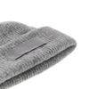 knitted beanie hat with gros-grain logo