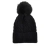 wool beanie hat with fur pompom