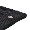 wool beanie hat with fur pompom